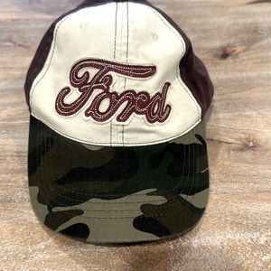 Women’s brown/camouflage Ford adjustable baseball cap trucker hat. 100% One size
